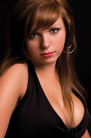 Young baeautiful girl on blackの写真素材