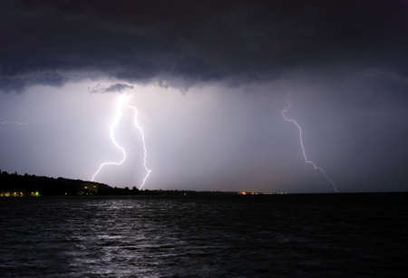 Lightning above the lakeの写真素材