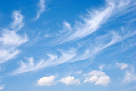White fluffy clouds in the blue sky