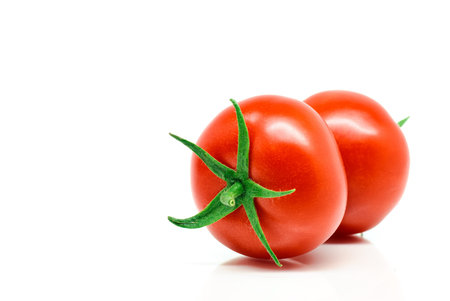 Red tomatoes isolated on white backgroundの写真素材