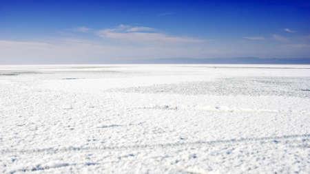 Lake landscapes with snow on the iceの写真素材