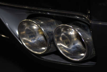 Close up of an automobile's twin exhaust の写真素材