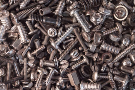 Texture of metal fasteners, bolts, nuts, screws.の写真素材