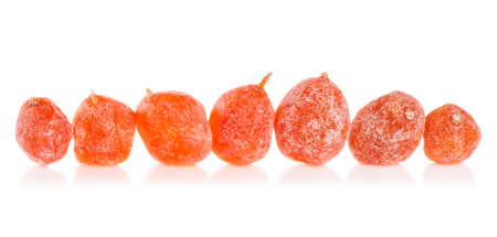 Dried kumquat isolated on white close-upの写真素材