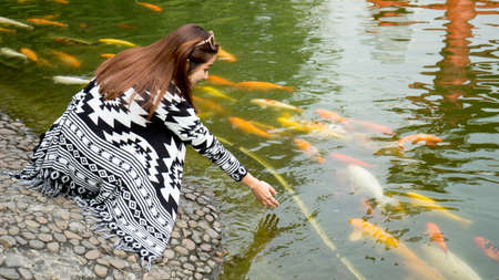 Play with the fishの写真素材