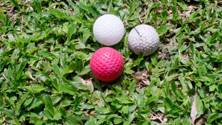 Clown face shape out of the golf ballの写真素材