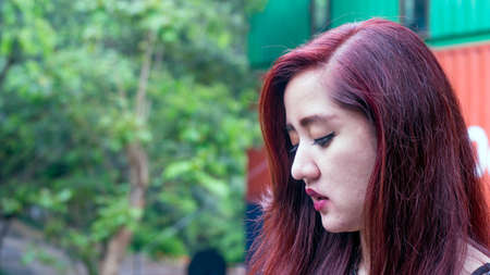 Beautiful asian girl posing in cafe, drinking, walking around and enjoy the environment of the cafeの写真素材