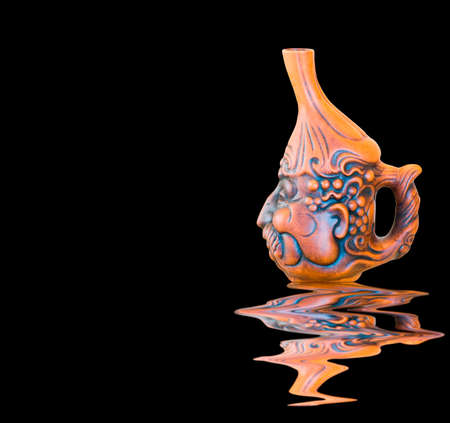Clay Jug on black backgroundの写真素材