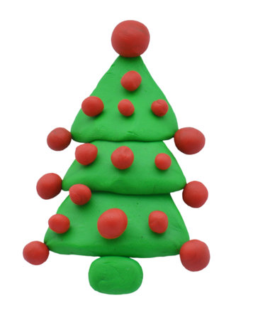 Clay Christmas spruce or pine isolated on white background. Icon of hand made plasticine treeの写真素材