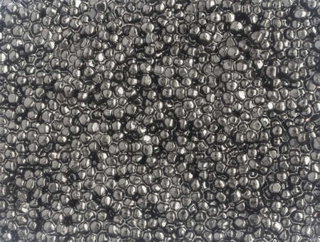 Artificial black caviare texture. Vegetarian or vegan backgroundの写真素材
