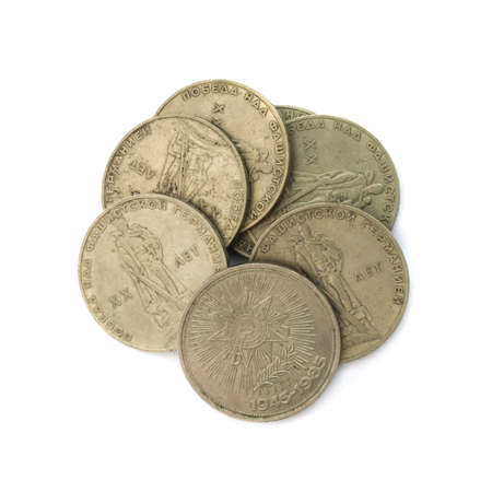 Old expired rubles with a monument to the Soviet soldier with a girl in his arms. Heap of antique money isolatedの写真素材