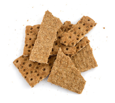Rye or black bread crumbs isolated on a white background