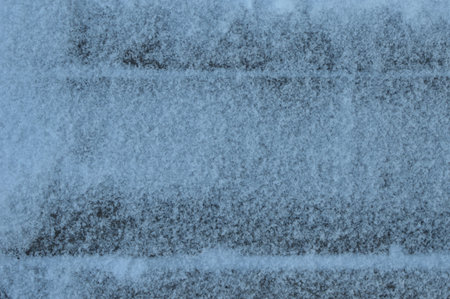 Hoarfrost on wooden pavement or frozen boards with ice top coatの写真素材