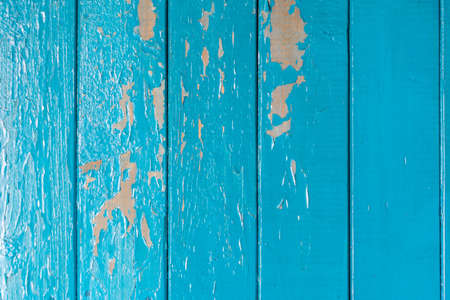 Grunge Background with Old Wooden Painted Blue Wall. Bubbles and Cracks Shabby Textureの写真素材