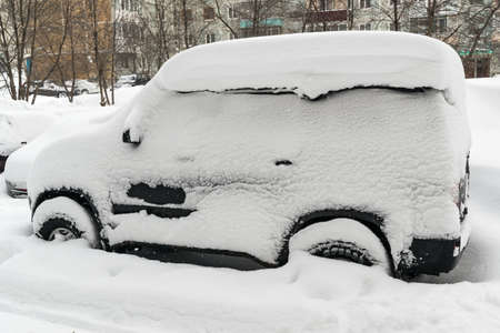 Car Covered With Snow After a Winter Blizzardのeditorial素材