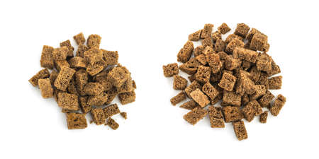 Rye or black bread crumbs isolated on a white backgroundの写真素材