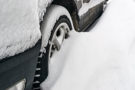 Car Covered With Snow After a Winter Blizzardの写真素材