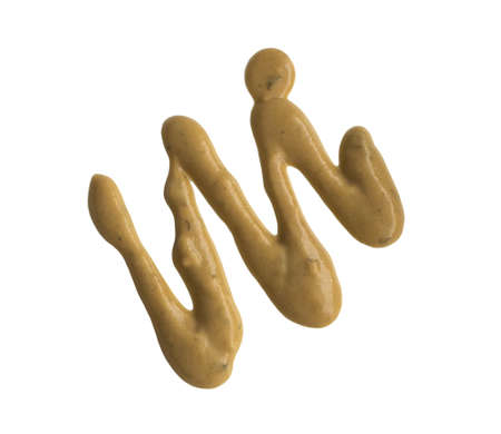 Mustard Sauce Splash with Spices Isolated with a Clipping Path on White Backgroundの写真素材