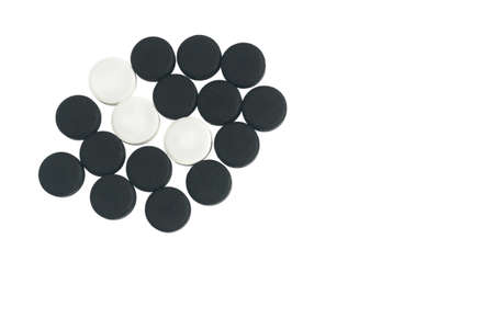 Black Activated Charcoal and White Chloramphenicol Tablets. Absorbent Carbon Isolated on White Backgroundの写真素材