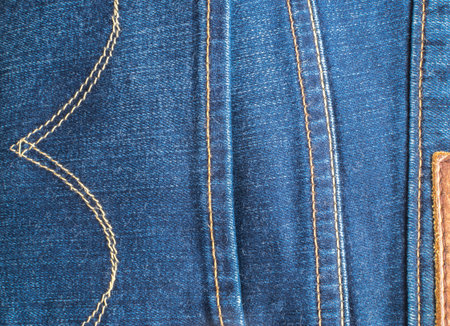 Blue Jeans and Stitches Texture. Denim Background with Seam