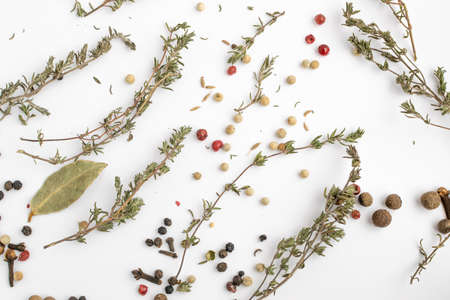Group of Dry Spices with Thyme and Black Pepper Isolated on White Background Top Viewの写真素材