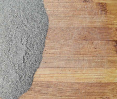 Heap of Ground Black Pepper on Old Wooden Background Top Viewの写真素材