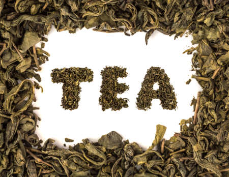 Frame of Natural Green tea Leaves Background with the Word TEAの写真素材