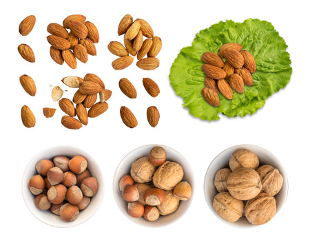 Collection of broken and whole nuts isolated on white. Clipping paths. Top view. Shadowlessの写真素材