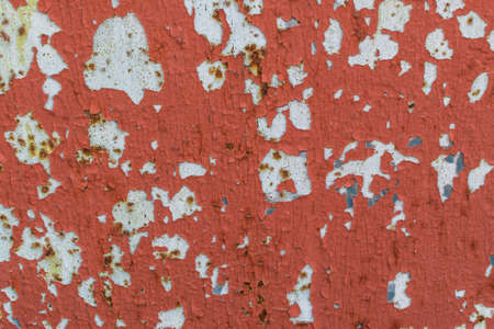 Dark Rusted Metal Texture. Old Grunge Background with Peeling Red Paintの写真素材