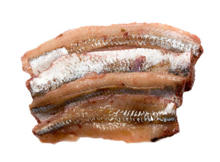 Solted fish filet isolated on white background. Marinated herring with clipping path. Flat lay and top viewの写真素材