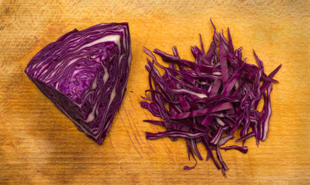 Cut of Red Cabbage Isolated Top View. Fresh Healthy Vegetable on Cutting Boardの写真素材