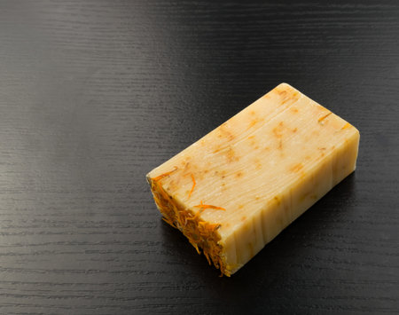 Homemade Herbal Soap with Petals of Calendula Top Viewの写真素材