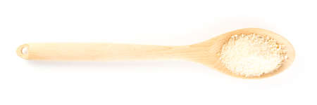 Heap of Bread Crumbsin Wooden Spoon Top View. Crushed Rusk Bread Crumbs or Panko Isolatedの写真素材