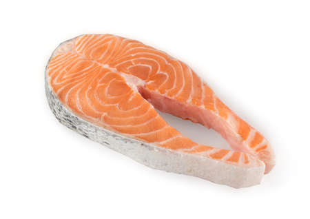 Slice of Raw Salmon Steak Isolated on White Background. Thick Piece of Fresh Red Fish or Trout with Clipping Pathの写真素材