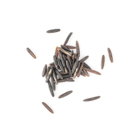 Grains of Raw Black Wild Rice Isolated on White Background Top Viewの写真素材