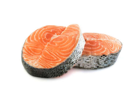 Slice of Raw Salmon Steak Isolated on White Background.の写真素材