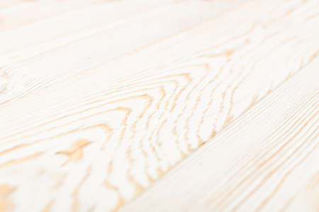 Beautiful vintage white wooden background. Old painted wood table surface. Rustic light coloured desk board or plank texture with copyspace for product montageの写真素材
