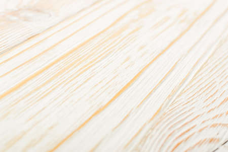 Beautiful vintage white wooden background. Old painted wood table surface. Rustic light coloured desk board or plank texture with copyspace for product montageの写真素材