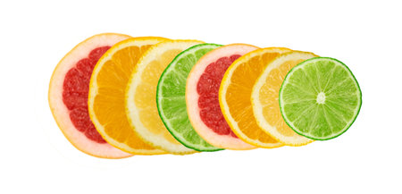Line of sliced lemon, orange, lime and red grapefruit flat lay and top view. Macro photo of citrus...