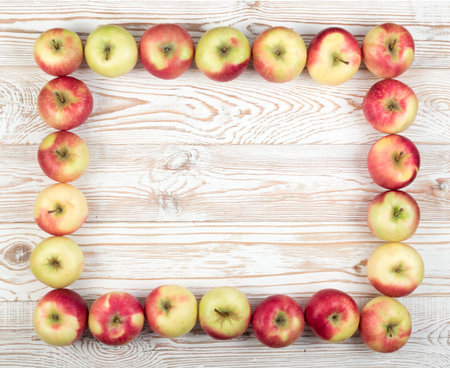 Whole Red and Green Soft Apple Pattern Top View with Place for Text. Rectangular Fruit Frame or...