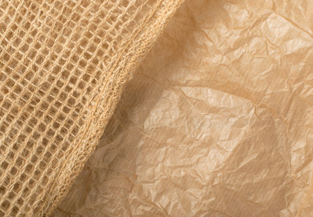 Crumpled Craft Paper with Burlap Top View with Copy Space for Collages, Design and Montage. Empty...