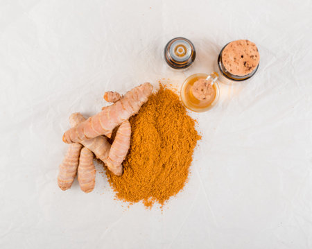 Turmeric Root Oil and Orange Seasoning Powder Mix in White Packaging Paper Top View
