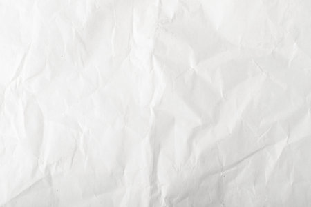 Sheet of White Thin Crumpled Craft Paper Background Top View. Wrinkled Grey Wrapping Paper Texture...