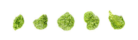 Pesto spread or blob isolated on white background. Green italian homemade spilled sauce made of ground basil, garlic, pine seeds, olives and pecorino sardo cheese top viewの写真素材