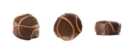 Round Milk Chocolate Sweet Candy Top View Isolated on White Background. Different Angles Macro Photo of Creative Cocoa Chocolates, Sweets, Truffles or Bonbons Close Up with Clipping Pathの写真素材