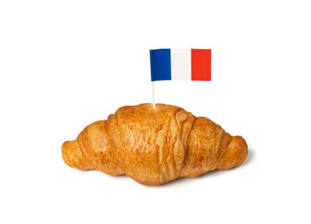Single French Butter Croissant with Flag Isolated on White Backgroundの写真素材
