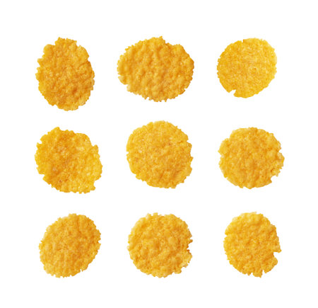 Set of yellow corn cereal for breakfast isolated on white background. Crispy corn flakes, cornflakes...