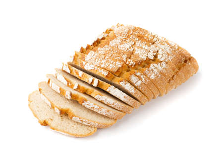 Traditional sliced bread isolated on white background. Pieces of homemade brown organic cereal loaf made of sourdough dough, slices of freshly baked wheat rye breadの写真素材