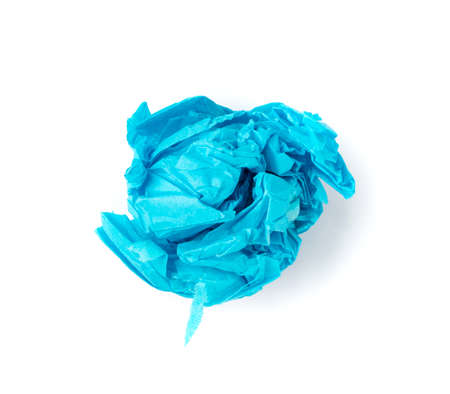 Crumpled Tissue Paper Ball Isolated on White background. Blue Wadded Up Rolling Cigarette Paper. Scrunched Tracing Paper Page Ballの写真素材