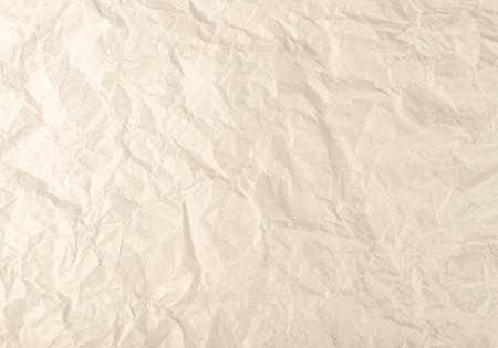 Crumpled Kraft Paper Texture Background. Wrinkled and Straightened Wrapping Paper Sheet Pattern,...